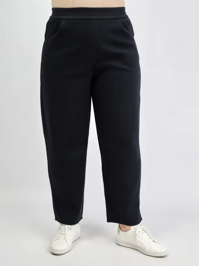 Брюки с защипами 