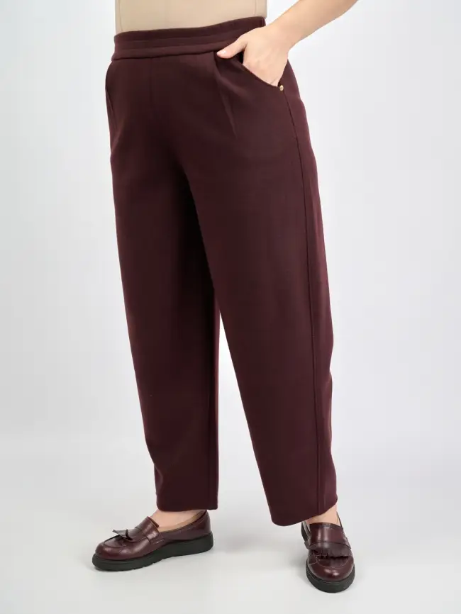 Брюки с защипами 