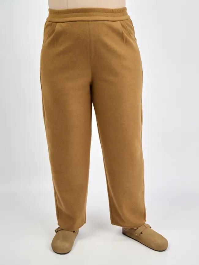 Брюки с защипами 