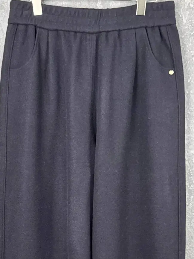 Брюки с защипами 