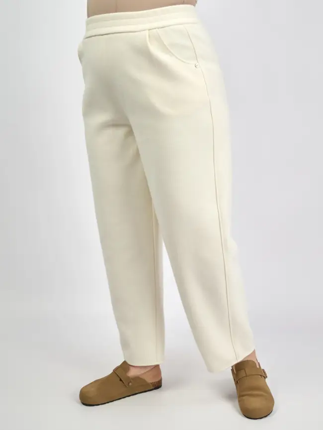 Брюки с защипами 