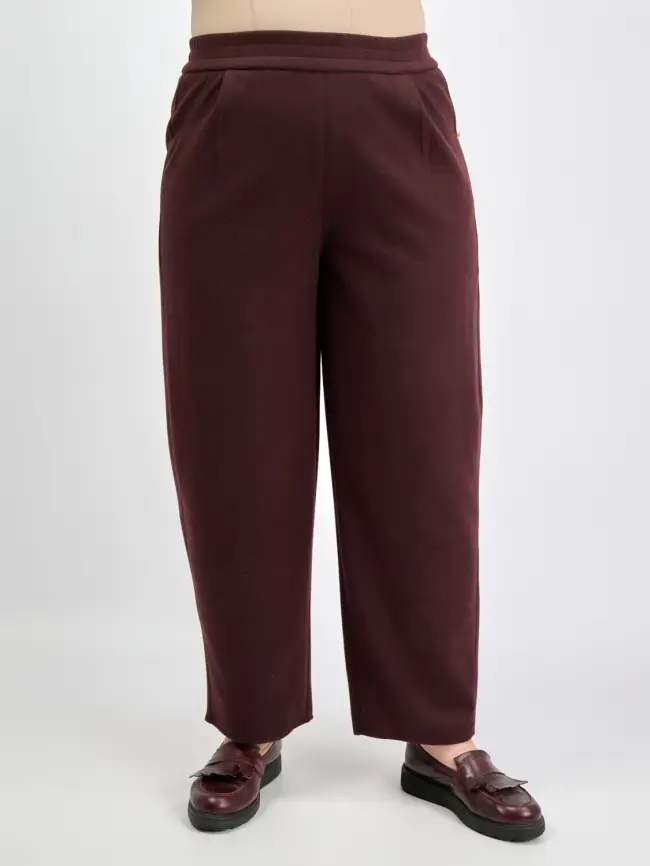 Брюки с защипами 