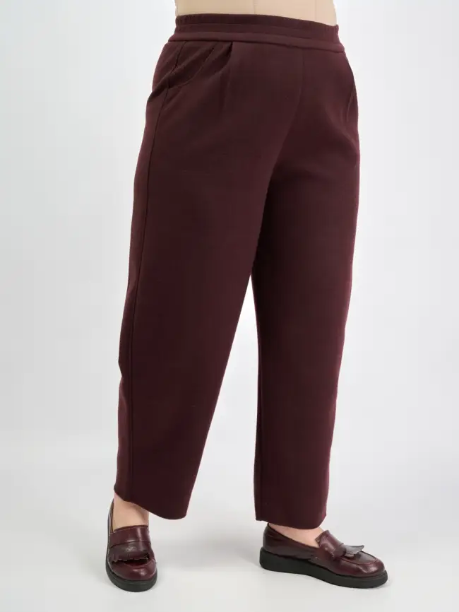 Брюки с защипами 